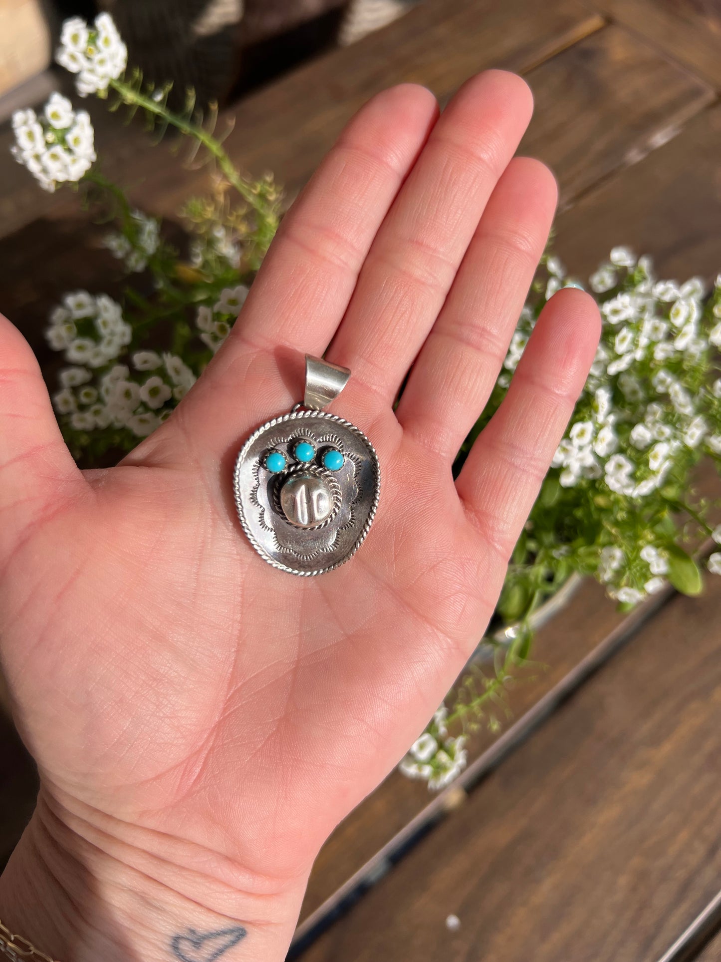 Cowboy hat pendant by Navajo artist Bobby Platero