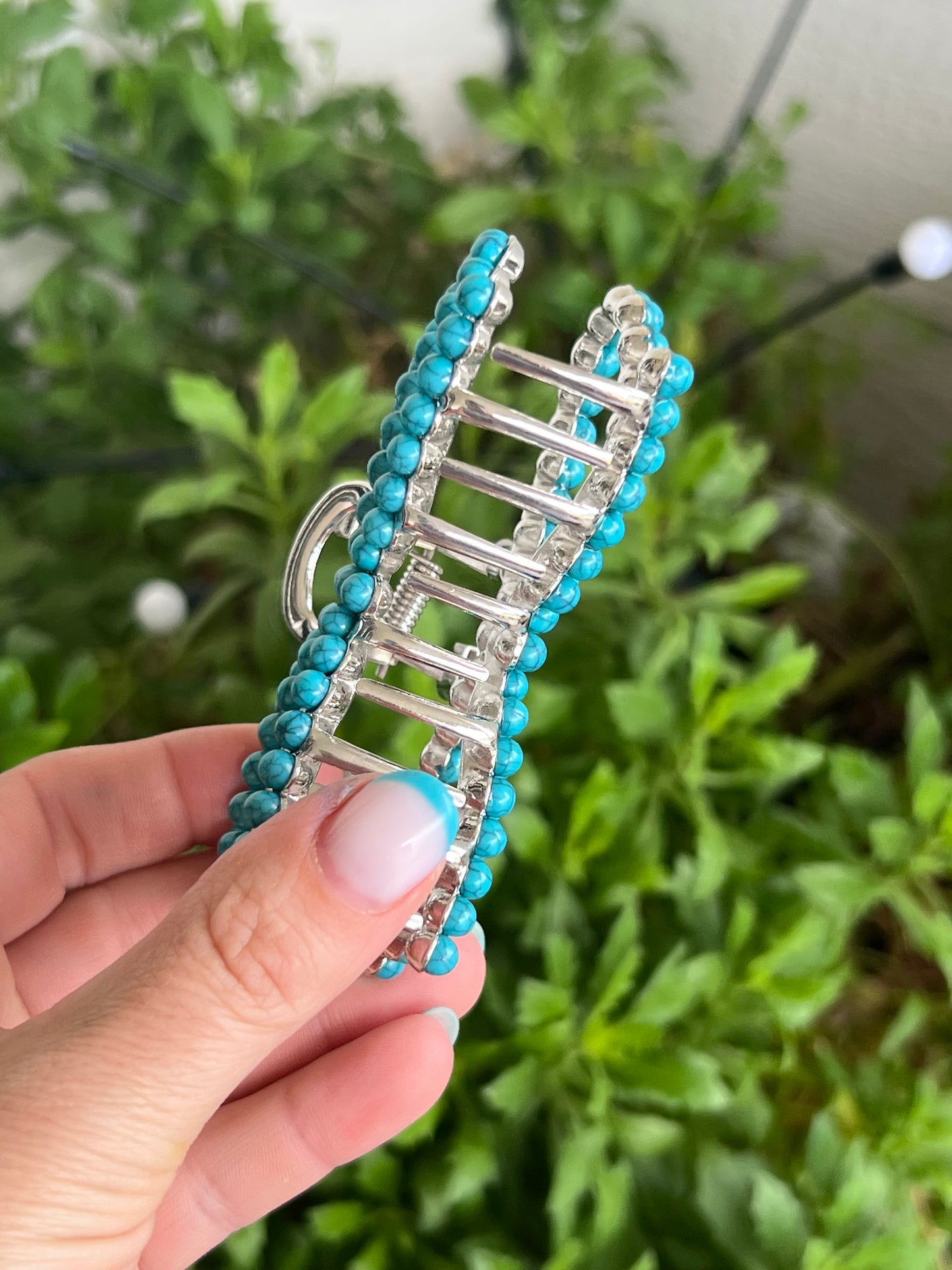 Faux turquoise bow claw clip
