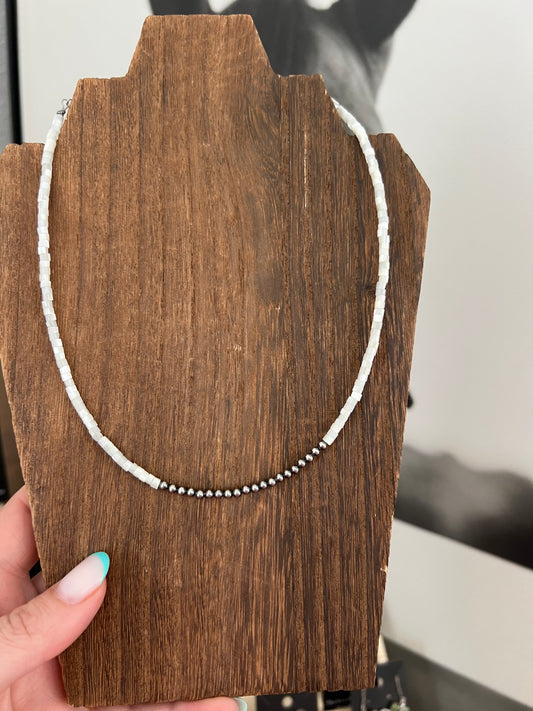 3mm Sterling Silver Peaels in White Shell Choker 
14” with 3” extender