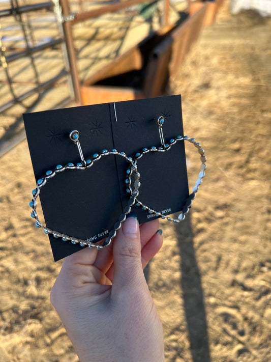 Heart dangles by Dixie Boogua
