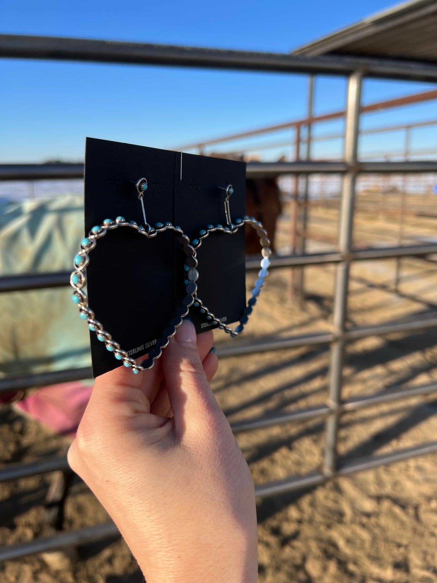 Heart dangles by Dixie Boogua