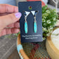 White buffalo and turquoise drop earrings by Turnback pony
