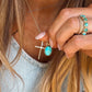 Gold cross necklace by Turnback pony