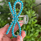 Faux turquoise bow claw clip