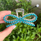 Faux turquoise bow claw clip