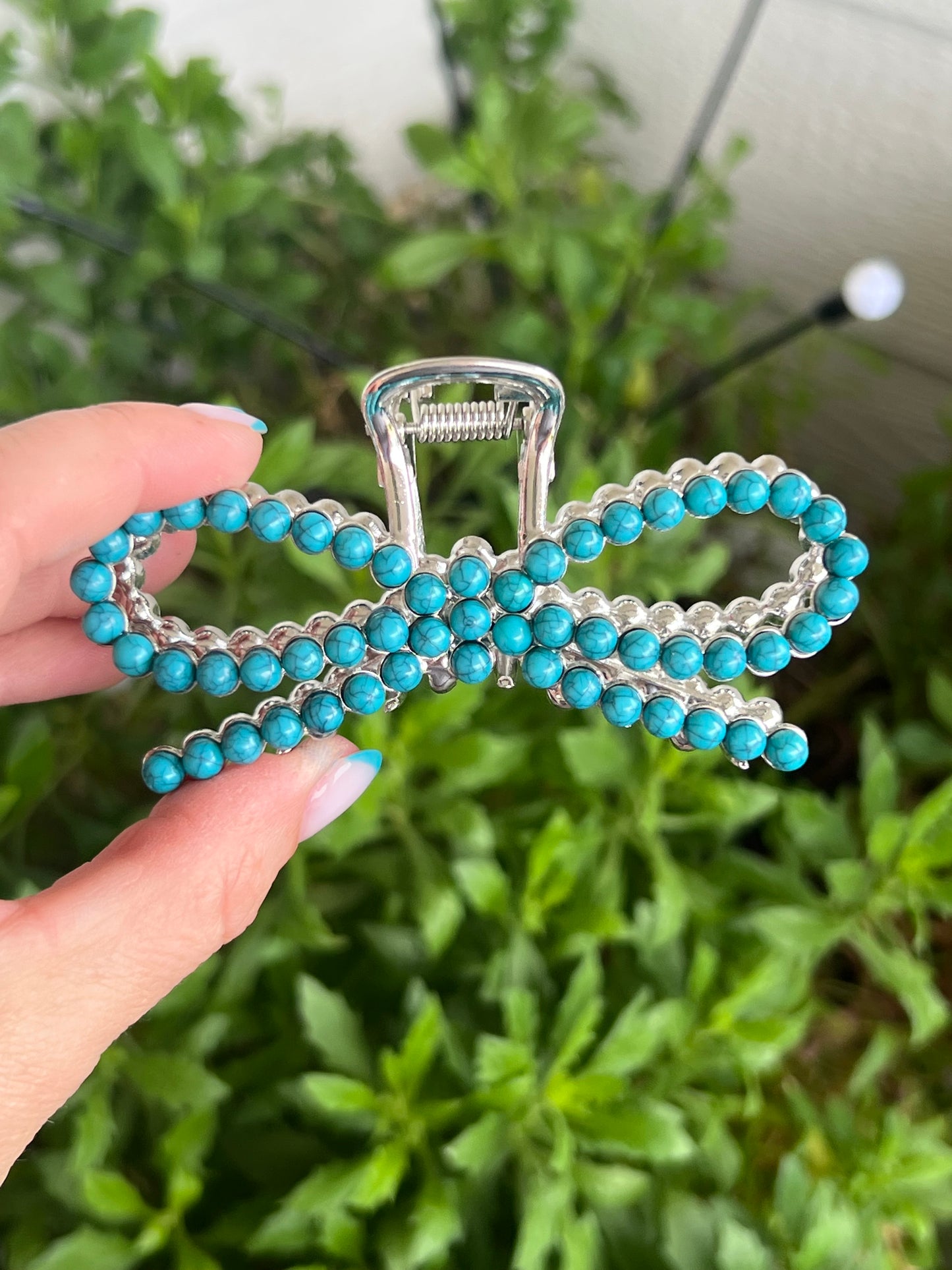 Faux turquoise bow claw clip