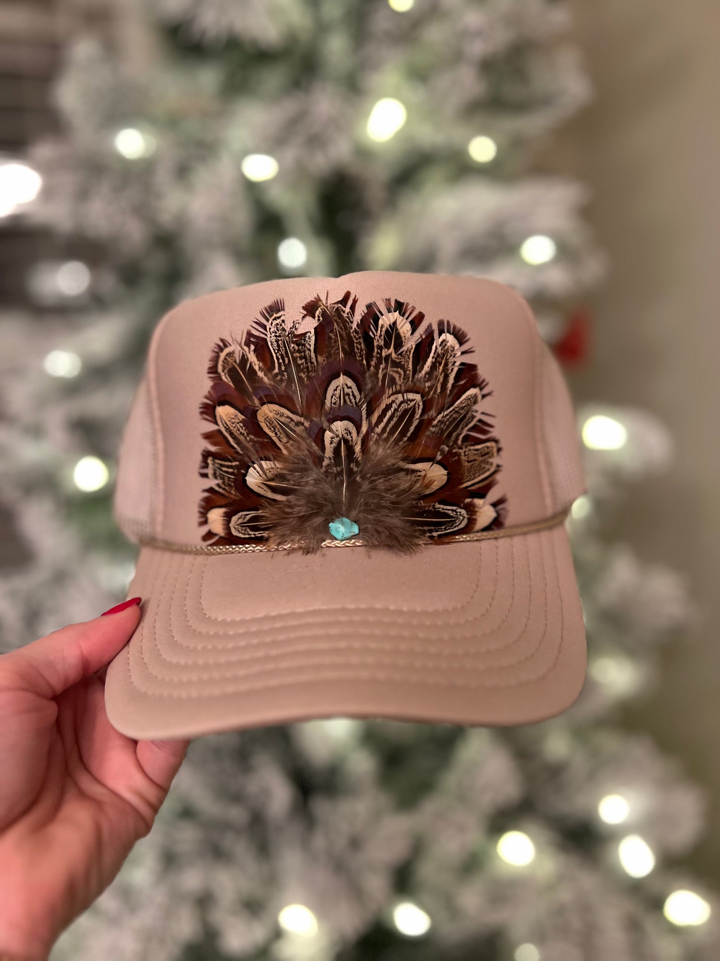 Feather trucker hat by Tammi