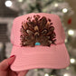 Feather trucker hat by Tammi