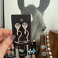 Cobra statement earrings