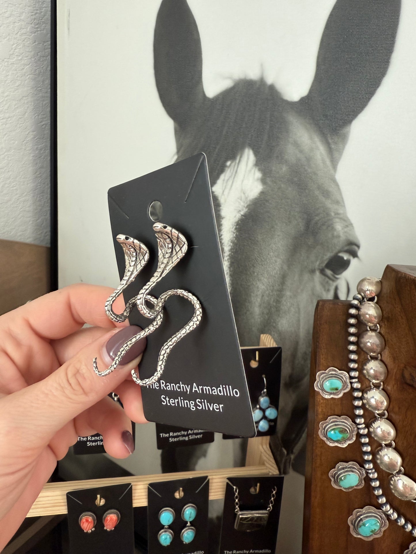 Cobra statement earrings