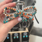Bow multi colored faux stone claw clip