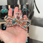 Bow multi colored faux stone claw clip